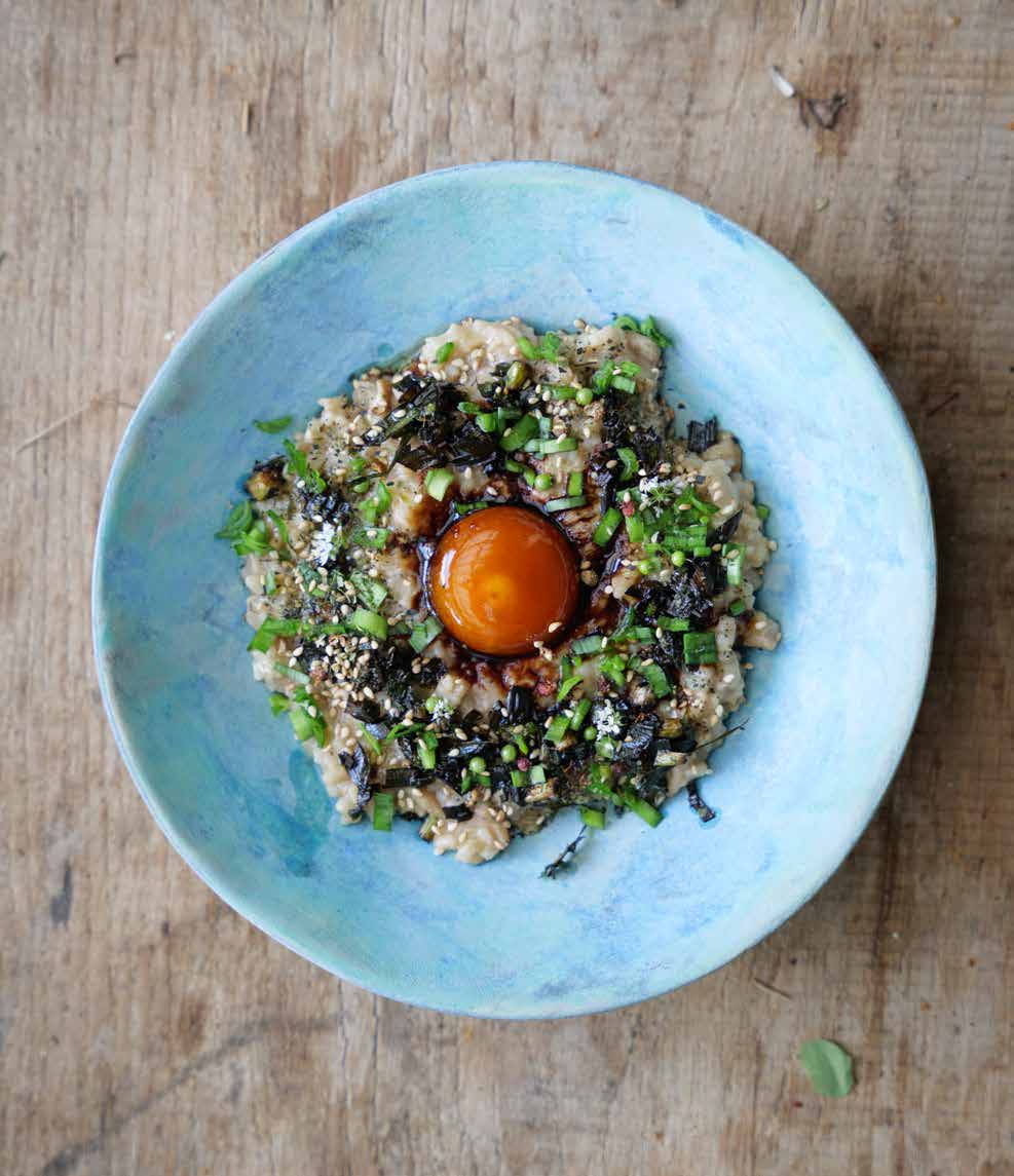 Congee with hollow-stemmed bolete and soy-cured egg yolk