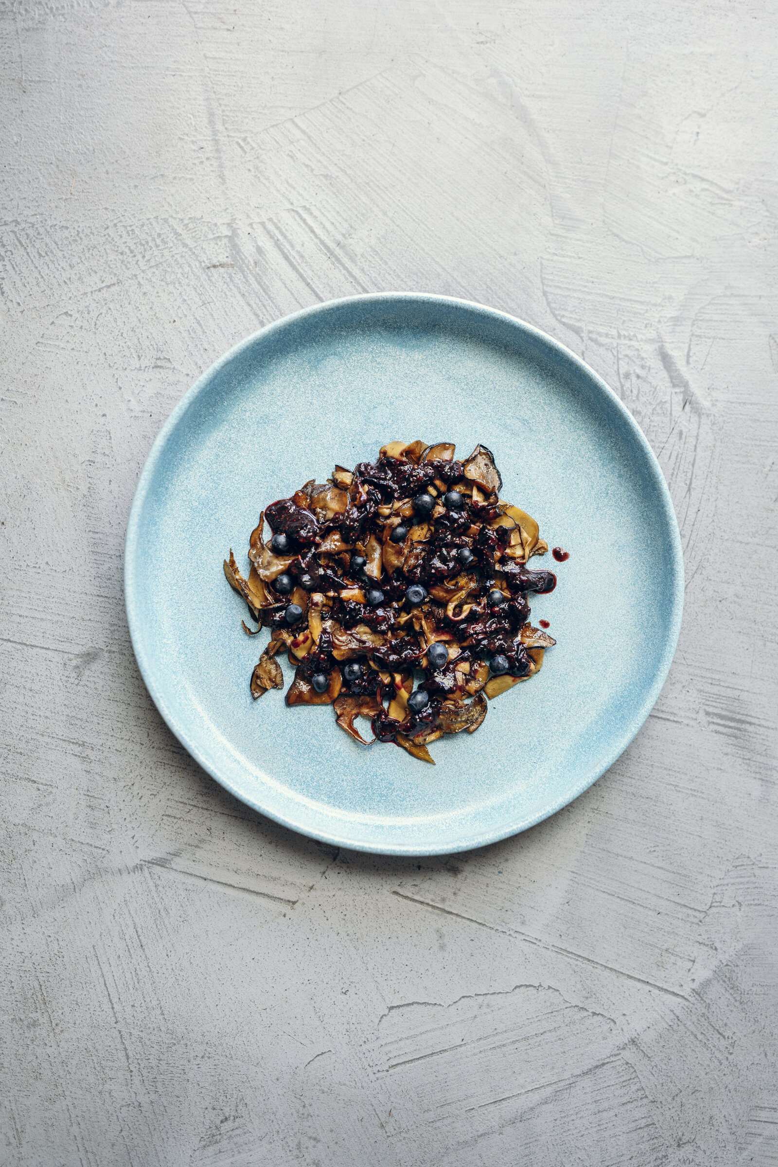 Indigo bolete with ant-blueberry paste