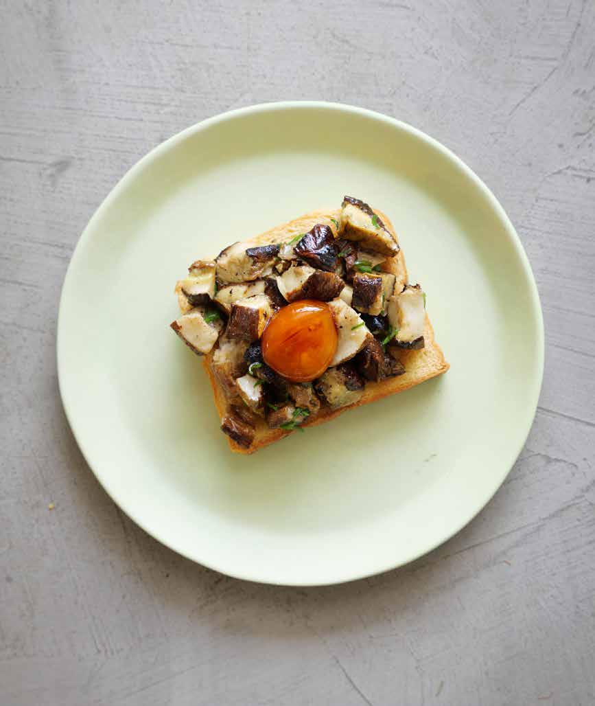 Toast with smoked mushrooms and soy-cured egg yolk